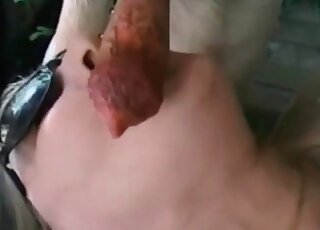 The cock of this hound gets sucked off by a total slut