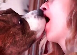 Shy girl is making out with her beautiful doggo